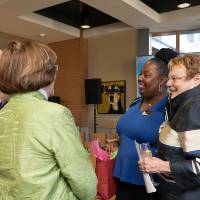 Lynn Blue posing with friends at the Lynn M. Blue Connection Naming Ceremony